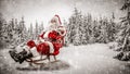 Santa Claus with a lantern and sack of presents on the sled with a blurred snowy winter Christmas day background. Royalty Free Stock Photo