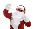 Santa Claus listening to Christmas music on  background Royalty Free Stock Photo