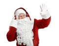 Santa Claus listening to Christmas music Royalty Free Stock Photo