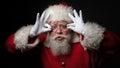 Santa claus look through glasses Royalty Free Stock Photo