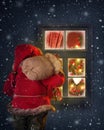 Santa Claus looking through a window Royalty Free Stock Photo