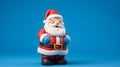 Santa Claus made by clay blue background for Christmas wallpaper background with text space.