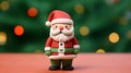 Santa Claus made by clay on green and red blur background for Christmas wallpaper background with text space.