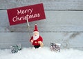 Santa Claus with Merry Christmas sign Royalty Free Stock Photo