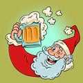 Santa Claus and a mug of beer with foam. Spending the new year in a fun company with food and drinks. Good mood on the Royalty Free Stock Photo