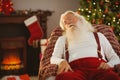 Santa claus napping on the armchair Royalty Free Stock Photo