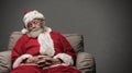 Santa Claus napping on the armchair Royalty Free Stock Photo