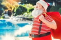 Santa Claus near the pool holiday vacation concept Royalty Free Stock Photo