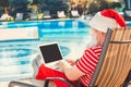 Santa Claus near the pool holiday vacation concept Royalty Free Stock Photo