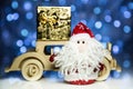 Santa Claus and old retro wooden car with gift box Royalty Free Stock Photo