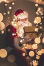 Santa Claus opening illuminated gift box