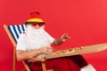 Santa claus in panama and sunglasses Royalty Free Stock Photo