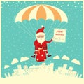 Santa Claus on parachute fly in winter sky.