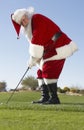 Santa Claus Playing Golf Royalty Free Stock Photo