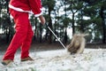 Santa Claus playing golf in the leisure time during daytime