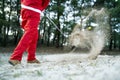 Santa Claus playing golf in the leisure time during daytime