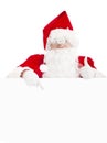 Santa Claus pointing at blank banner with thumb up Royalty Free Stock Photo