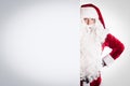 Santa Claus pointing in white blank sign Royalty Free Stock Photo