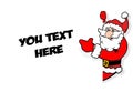 Santa Claus points from around corner Royalty Free Stock Photo