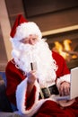 Santa Claus purchasing on internet