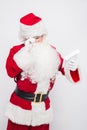 Santa Claus Reading Letter isolated over white baclground Royalty Free Stock Photo