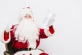 Santa Claus Reading Letter isolated over white baclground Royalty Free Stock Photo