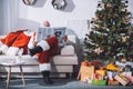 Santa claus reading newspaper Royalty Free Stock Photo