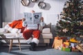 Santa claus reading newspaper Royalty Free Stock Photo