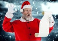 Santa claus reading wish list Royalty Free Stock Photo