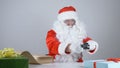 Santa Claus reads a letter and reloads a gun 50 fps