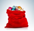 Santa Claus red bag with Christmas toys on background. Royalty Free Stock Photo