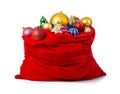 Santa Claus red bag with christmas toys, isolated on white background. File contains a path to isolation. Royalty Free Stock Photo