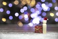 Santa claus with red Christmas gift box on wooden table with bokeh background and copy space, Merry Christmas,holiday Royalty Free Stock Photo