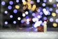 Santa claus with red Christmas gift box on wooden table with bokeh background and copy space, Merry Christmas,holiday Royalty Free Stock Photo