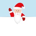 Santa Claus in red clothes beckons blue background