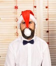 Santa Claus in hat with calm face. Man with beard Royalty Free Stock Photo