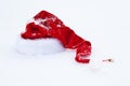 Santa Claus red hat on white snow Royalty Free Stock Photo