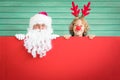 Santa Claus and reindeer child Royalty Free Stock Photo