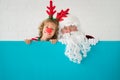 Santa Claus and reindeer child Royalty Free Stock Photo