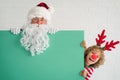 Santa Claus and reindeer child Royalty Free Stock Photo