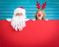 Santa Claus and reindeer child Royalty Free Stock Photo