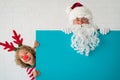 Santa Claus and reindeer child Royalty Free Stock Photo