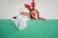 Santa Claus and reindeer child Royalty Free Stock Photo