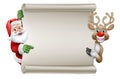Santa Claus and Reindeer Christmas Scroll Sign Royalty Free Stock Photo