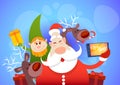 Santa Claus With Reindeer Elfs Making Selfie Photo, New Year Christmas Holiday Greeting Card Royalty Free Stock Photo