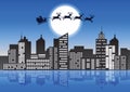 Santa Claus and reindeer fly over the city to send gift to people,lots of skyscraper and light form window