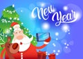 Santa Claus With Reindeer Making Selfie Photo, New Year Christmas Holiday Greeting Card Royalty Free Stock Photo