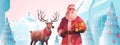 santa claus with reindeer standing town street with decorated christmas trees happy new year holiday celebration