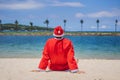 Santa Claus relaxing on sea beach - christmas or happy new year concept. Christmas in the tropics after quarantine was Royalty Free Stock Photo