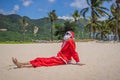 Santa Claus relaxing on sea beach - christmas or happy new year concept. Christmas in the tropics after quarantine was Royalty Free Stock Photo